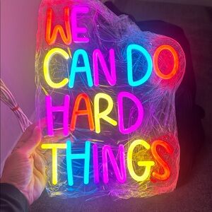 New In Box
Neon Sign that says WE CAN DO HARD THINGS